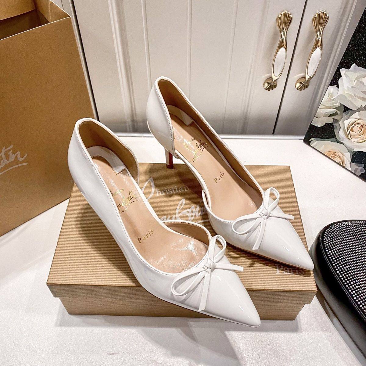 Christian Louboutin Bow Pumps